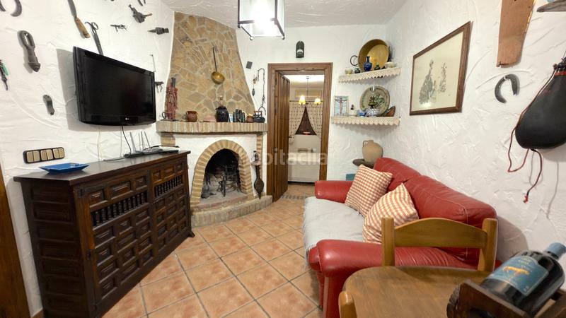 Foto 7f3791bb-c1bd-4886-a152-ffd8fb8e22c6. Affitto casale con camino piscina in Benamocarra