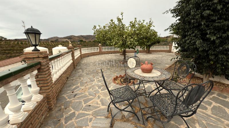 Foto 8c5432ab-02fa-4b02-8759-dcdaba271ef8. Affitto casale con camino piscina in Benamocarra