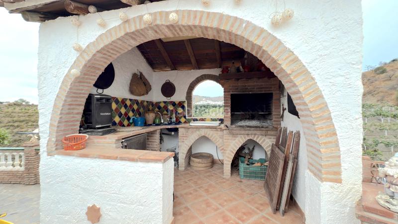 Foto b1f3dc8c-526a-49bc-b84a-8b2f5b3adf83. Affitto casale con camino piscina in Benamocarra