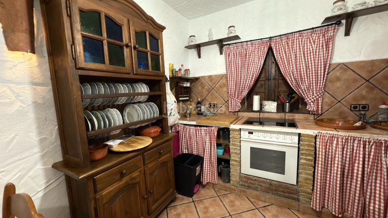 Foto b45513d3-df4b-49fc-9e29-2d45d788a682. Affitto casale con camino piscina in Benamocarra