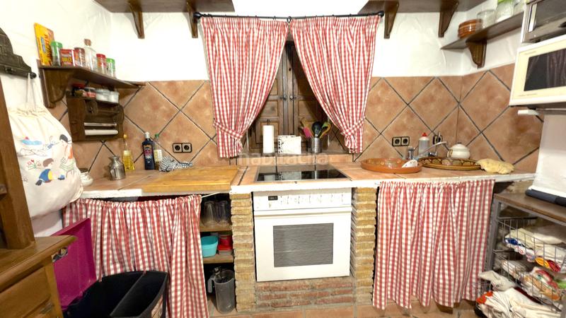 Foto c4b36424-d22f-4ee2-afc1-b60b95266ef5. Affitto casale con camino piscina in Benamocarra