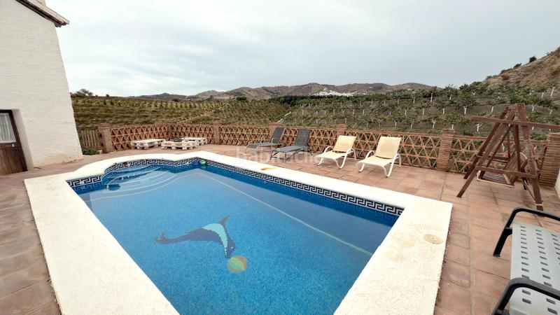 Foto ce37f8c4-24af-4b36-a3c5-cf36759aab8b. Affitto casale con camino piscina in Benamocarra