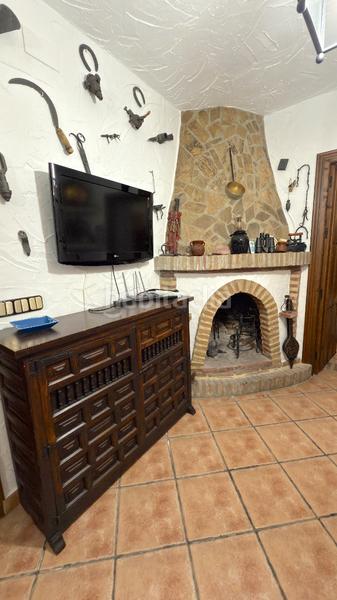 Foto d8e7738c-b73e-4375-abff-4b76a81d1f40. Affitto casale con camino piscina in Benamocarra