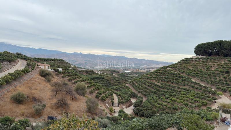 Foto e21f4d20-f279-4ead-b801-360fbe8ce652. Affitto casale con camino piscina in Benamocarra