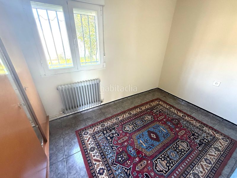 Foto 5233b282-439e-4129-adbd-1a3a1f44209d. Casa adossada amb xemeneia calefacció aparcament a Boñar