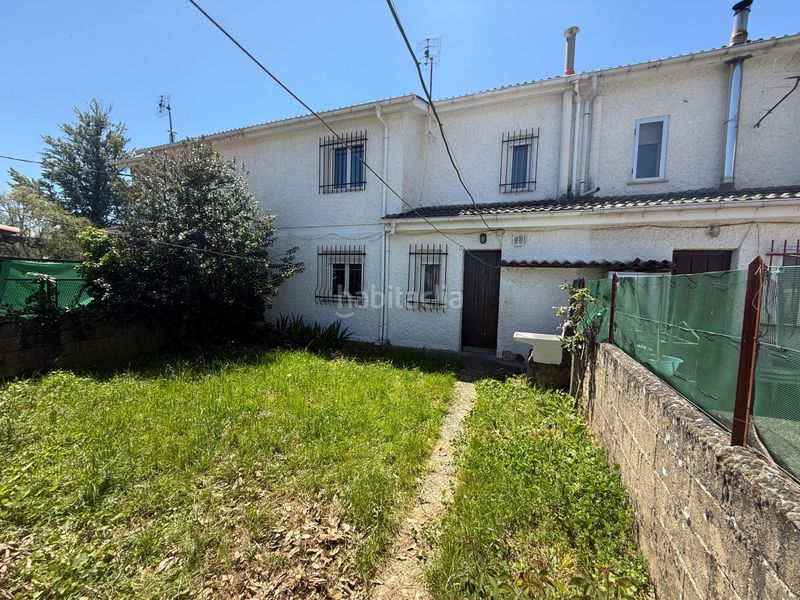 Foto 523f0735-abe1-40ce-96cd-db0170bd75ad. Casa adossada amb xemeneia calefacció aparcament a Boñar