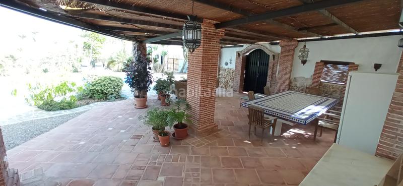 Foto f1a18aed-2420-445d-b167-f915a6fed37e. Masía en plaza principe de españa 1 increíble finca rústica en Coín
