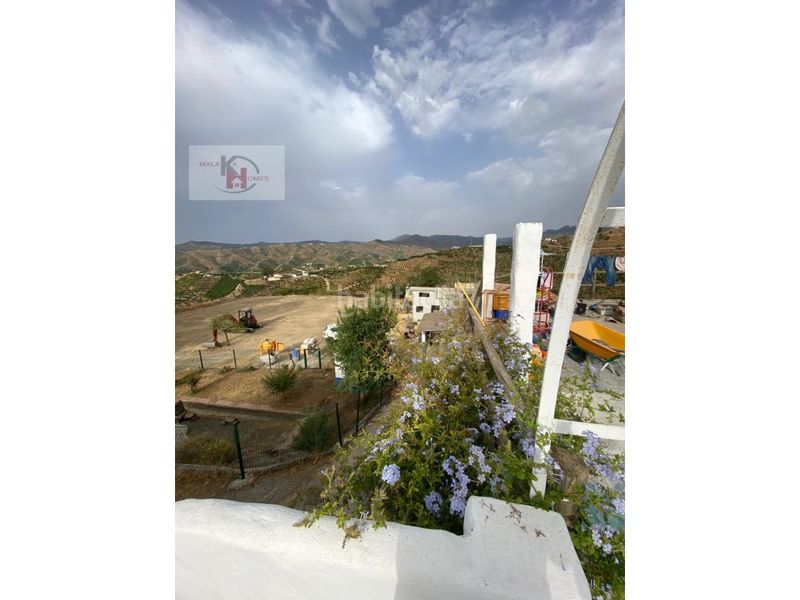 Foto bb7bbca3-e4ea-4fd3-a246-cdd85309c823. Casa amb aparcament a Norte - Barrio del Pilar - El Reñidero Vélez - Málaga