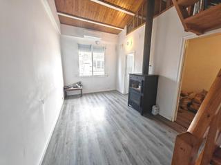 Appartamento  Joaquim de paz. Pis amb altell de fusta