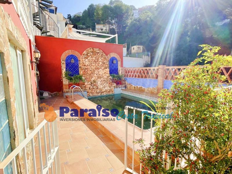 Foto 5e73a677-f740-4f02-ad6f-4e5a8ec3c407. Casa aparellada amb calefacció aparcament piscina a Almuñécar