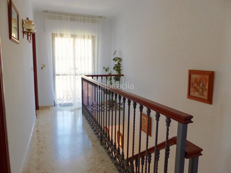 Foto ad53ce29-b009-4943-8f9e-39e3fe7fc9ec. Casa aparellada amb aparcament a Playa de la Regla Chipiona
