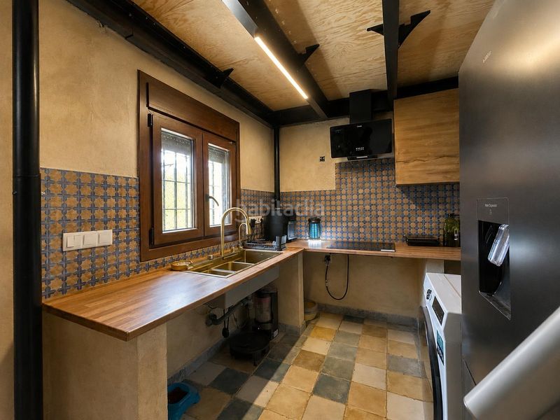 Foto cdc0b502-8dbd-4a42-9c54-bdec4b47db34. Casa amb aparcament a Las Tres Piedras - Costa Ballena Chipiona
