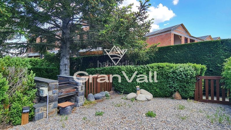 Foto 35321349-d6a7-4ba1-85b4-cf94784a0ea2. Casa adossada amb calefacció aparcament a Puigcerdà