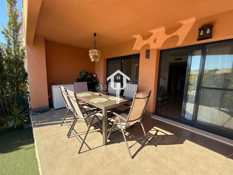 Foto f2948776-5e19-41f2-bde2-a830e1cf9a1b. Casa adosada chaelt adosado en venta en alenda golf en Monforte del Cid