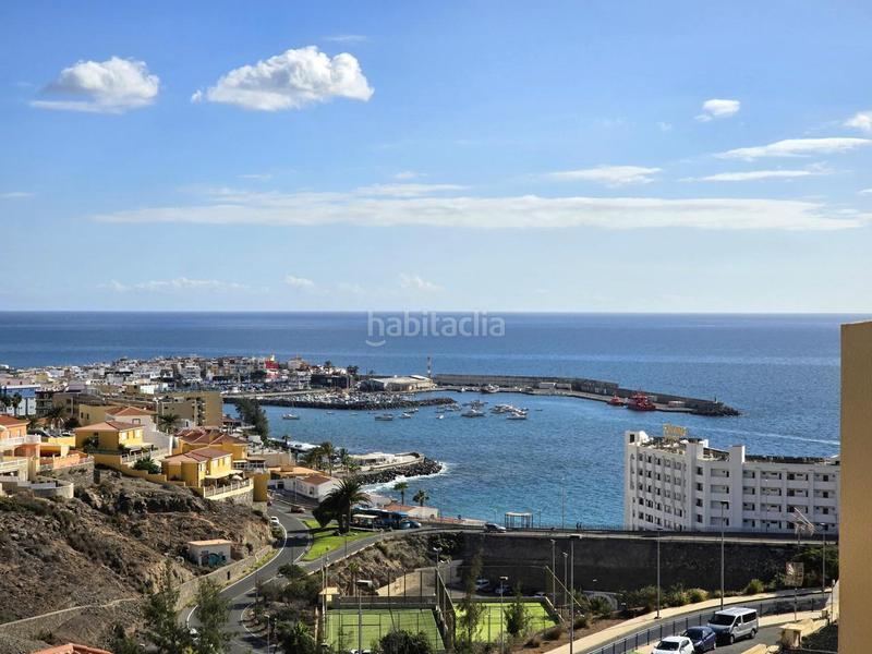Foto f2e58b3d-dd2a-42d9-86cf-b7678d536b2b. Alquiler piso  con vista al mar y al puerto de aArguineguín en Mogán
