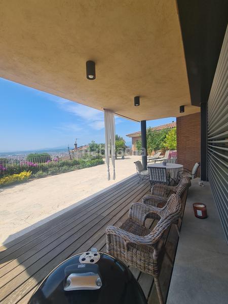 Foto 42988576-7b32-4259-8f9f-74155cc04343. Xalet amb xemeneia calefacció aparcament piscina a Girona