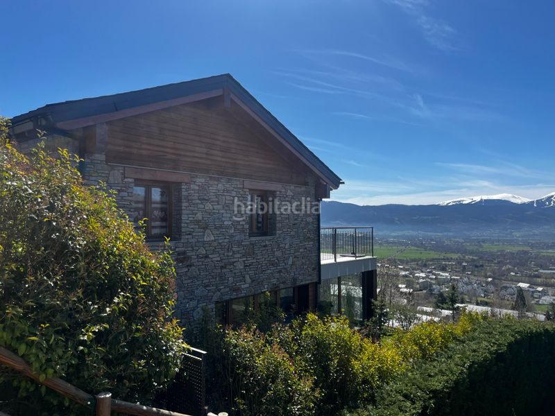 Foto 048fe029-4edc-43e3-a106-6af62462c66f. Casa amb xemeneia calefacció aparcament a Enveitg