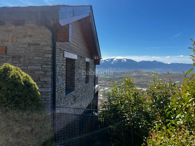 Foto 5acec6cf-a6de-4320-a294-8d8d1c30ca96. Casa amb xemeneia calefacció aparcament a Enveitg