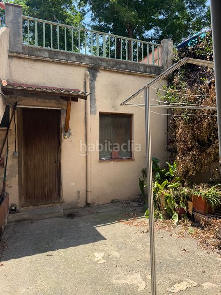Foto 189cc28e-4df3-46bb-b582-777f9a541f4e. Casa aparellada amb xemeneia calefacció aparcament a Sant Cugat del Vallès