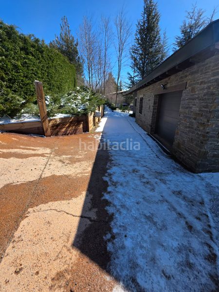 Foto 5de0b461-fecd-4e89-ad28-a0f7dd1cb9d0. Casa amb aparcament a Enveitg