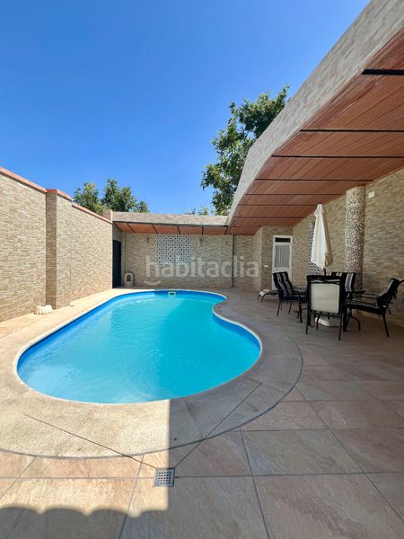 Foto 49950c3a-db82-4aed-8f86-2ebbc9689432. Masia amb piscina a Estepa