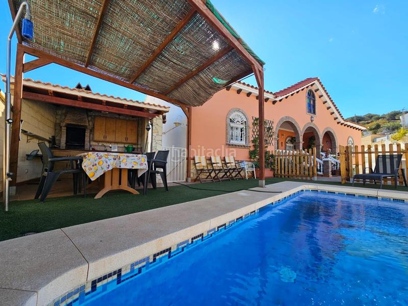 Foto 5309d044-821c-4845-ba19-341d32a85e1a. Xalet amb aparcament piscina a Viñuela