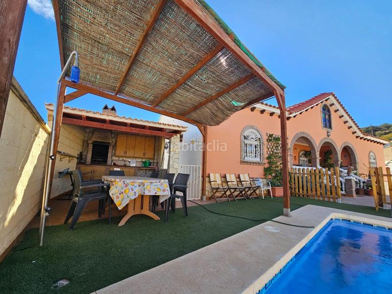 Foto 56a8ecc2-800a-4be4-af54-768e2aba2b2a. Xalet amb aparcament piscina a Viñuela