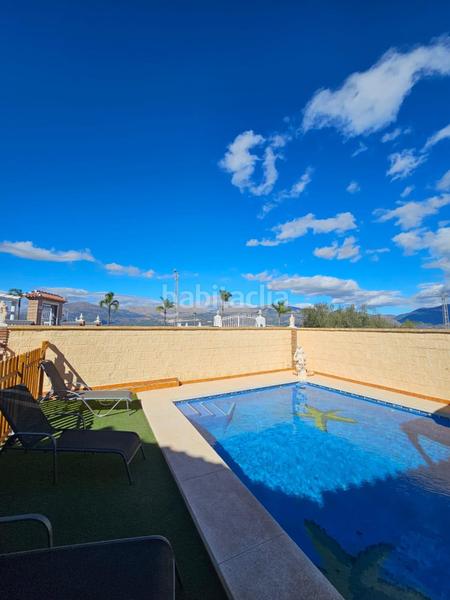 Foto eb98448e-c6ad-4949-afe2-59c57baf6089. Xalet amb aparcament piscina a Viñuela