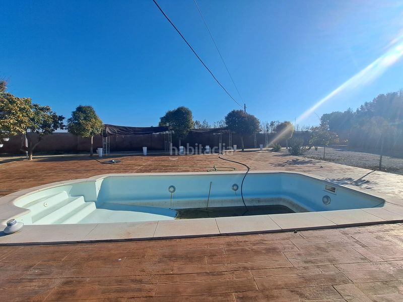 Foto b8a742f9-f347-4286-a35f-35edde20f264. Finca rústica cortijo a la venta en lachar (granada) en Láchar