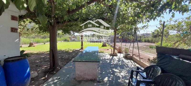 Foto 20c811d3-3c5d-441f-b91a-73839337466b. Chalet  en venta en Playa Burriana