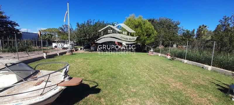 Foto ade2c4be-b136-4bc8-89ab-8dacb9650734. Chalet  en venta en Playa Burriana