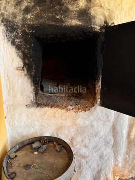 Foto bfdd7184-d30c-4137-8240-bb54b74979bd. Masia amb xemeneia calefacció aparcament a Los Blanquitos Granadilla de Abona