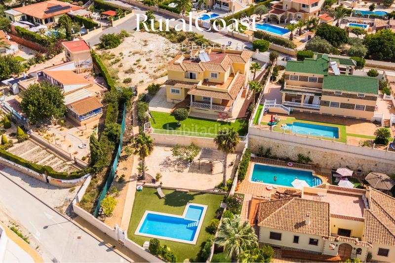 Foto 1d8df31b-fca0-4e62-927b-9236d8002422. Chalet magnifica villa de 500m2, 1200m2 parcela, 5 habitaciones, 3 baños, sótano, calefacción, aire acondicionado y piscina. en Busot