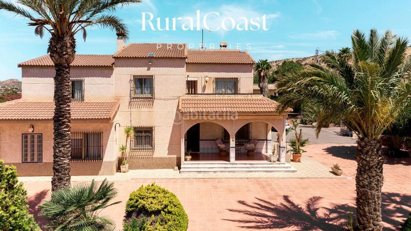 Foto a7c32c82-065d-42fa-92fd-f0bf3642daa8. Chalet finca exclusiva con vistas abiertas, olivos centenarios y cercanía al mar en elche rural en Elche / Elx