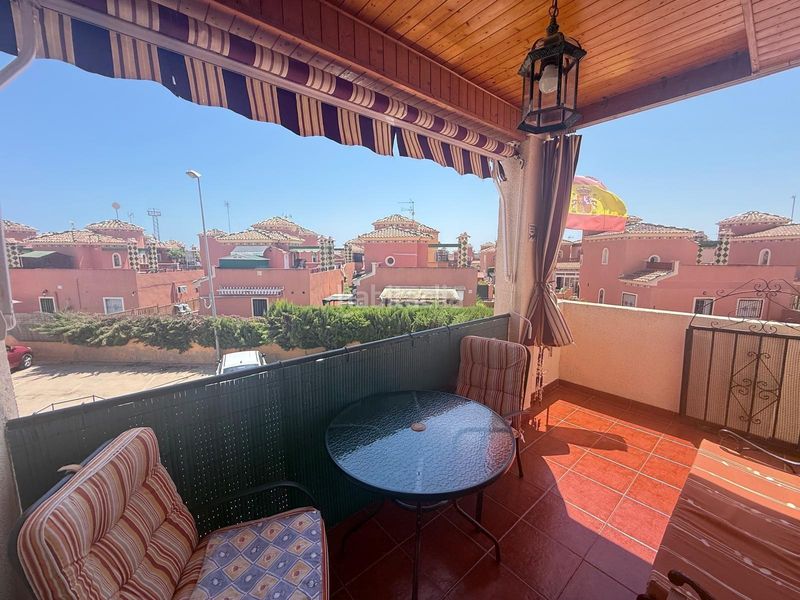 Foto 1529d2e0-8bfa-4349-8050-66298d520521. Casa amb aparcament a Playa Flamenca Orihuela