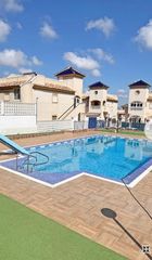 Casa adossada a El Edén. Bungalow bajo en guardamar  2 hab, 1 baño, piscina.