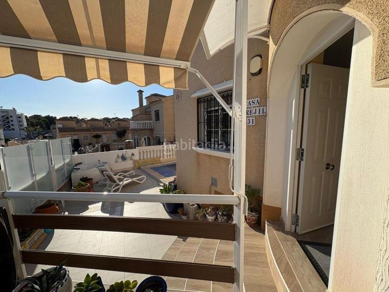 Foto e480f66a-d2ce-4ad4-9d69-a5359437c76a. Casa adossada a Villamartín-Las Filipinas Orihuela