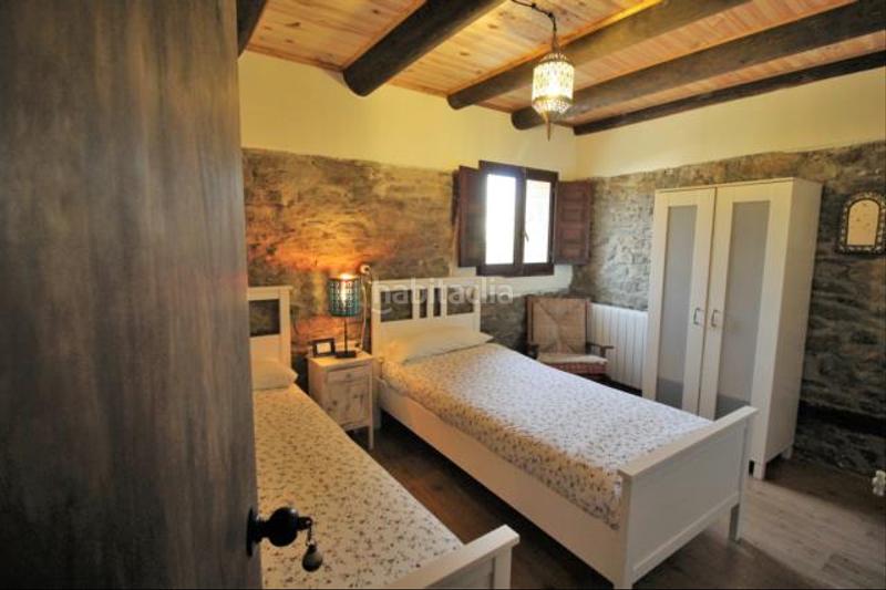 Foto bf984df6-da30-4f9c-891e-56c6f01b4698. Chalet con camino riscaldamento parcheggio piscina in Jaca