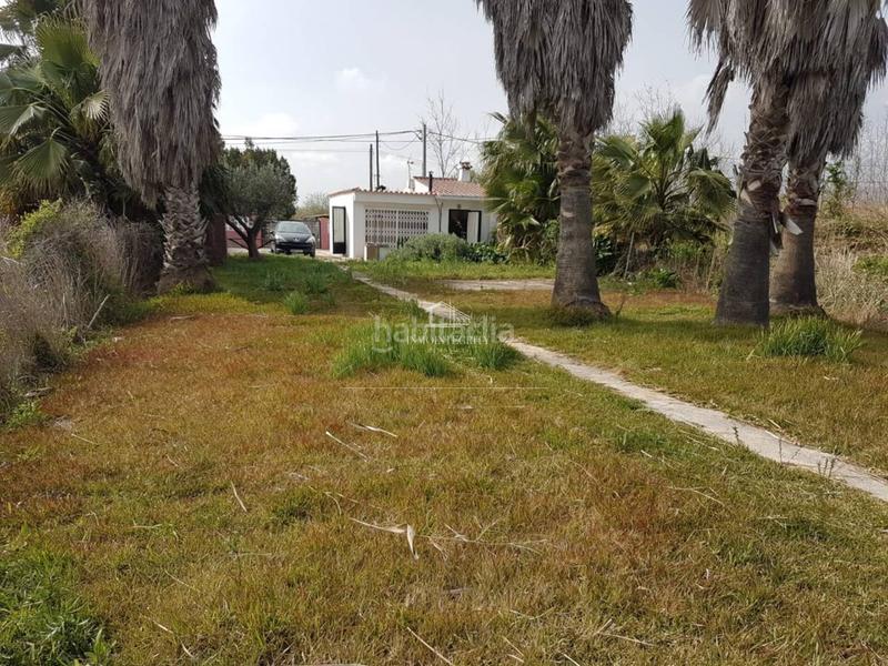 Foto c810887d-1cc2-48ac-819f-4ff1a1514618. Casa amb aparcament a El Grao Castellón de la Plana