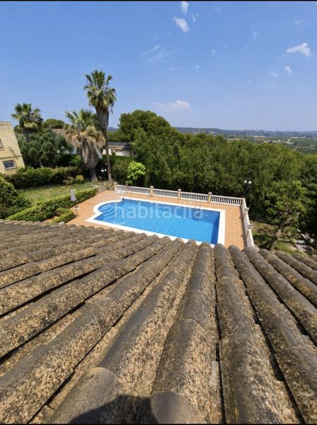 Foto af8455a8-a77b-494d-932e-5738d908f9cd. Chalet with fireplace heating parking pool in Picassent