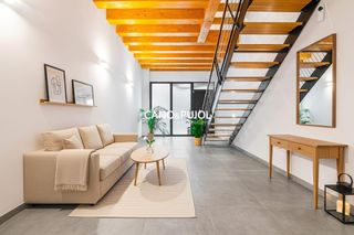 Casa a Centre. Un hogar que huele a madera y suena a pueblo