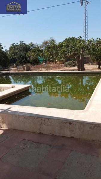 Foto fa32373d-b476-46e6-b9ba-95eae4073a7b. Chalet with fireplace heating parking pool in Alcolea Córdoba