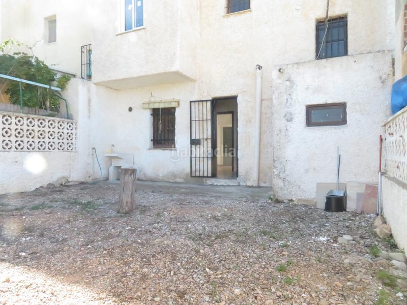 Foto 7ebdb47f-5a15-48e7-98b6-acbdcc495836. Maison jumelée avec cheminée parking dans Perín Cartagena