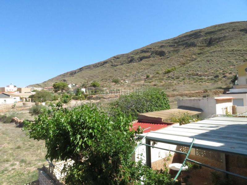 Foto b7304a59-1971-4ab7-affe-7b073df66e34. Reihenhaus mit kamin parking in Perín Cartagena