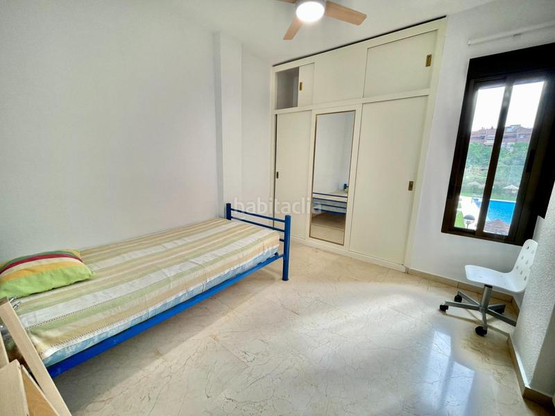 Foto e91948d3-08da-4ba3-847d-cc477e572a88. Location appartement avec chauffage piscine dans Ciudad Jardín - Zoco Córdoba