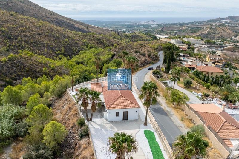 Foto d72307f2-87f3-46c2-9a67-5823d6af4427. Chalet en pago de cerrajon molvizar villa en venta en polígonos, 3 dormitorios. en Molvízar