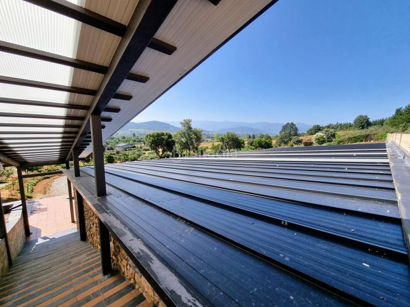 Foto c90a35cb-ef69-4219-9c77-fda42fffd545. Casa amb calefacció aparcament piscina a Flores de Sil - La Placa Ponferrada