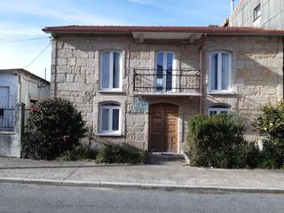 Casa adossada a Capela (A)