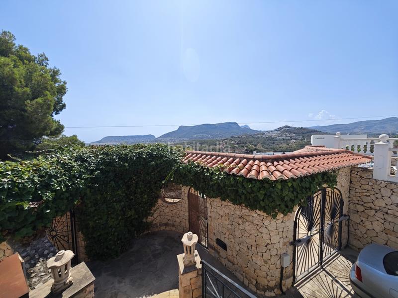 Foto ac15f429-348f-4e3d-a8de-8376a286543a. Chalet avec cheminée chauffage parking piscine dans Calp