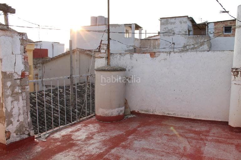 Foto adc2458b-22a7-4f16-ae1c-8ac3f8a4969c. Casa adosada en calle virgen soledad 10 en Olleria (l´)